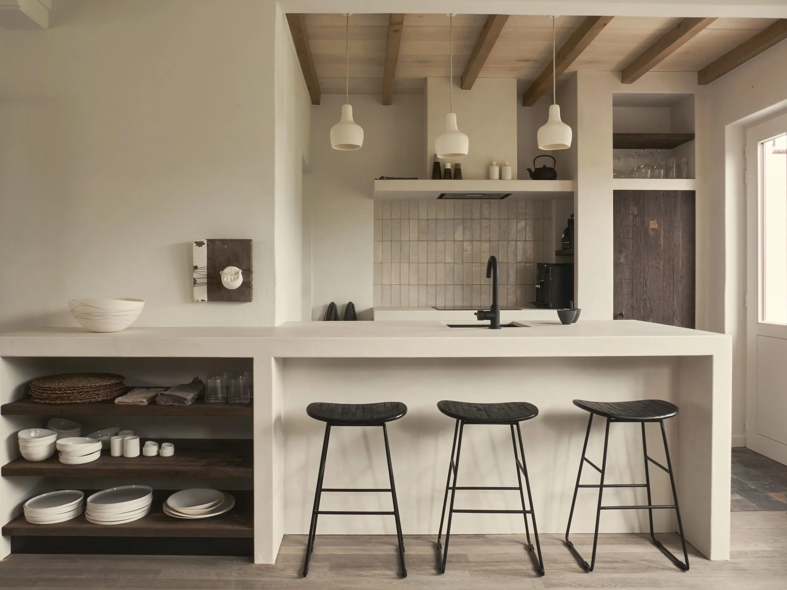 Light-filled living room with handmade ceramics