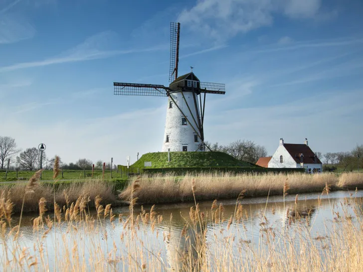 Windmill on the outskirts of Damme on a clear day